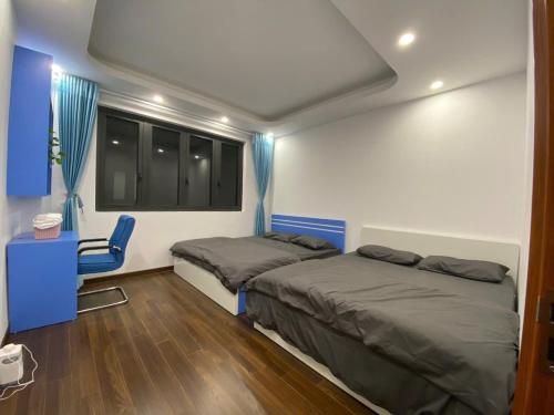 Кровать или кровати в номере Rose house