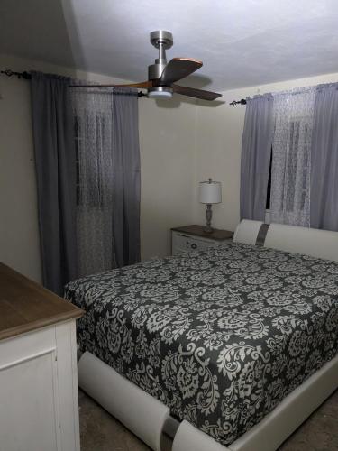 Ένα ή περισσότερα κρεβάτια σε δωμάτιο στο Bridgeview Arcadia Three