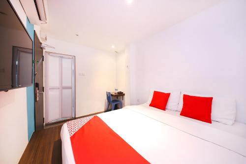Postel nebo postele na pokoji v ubytování Hotel O Link Inn