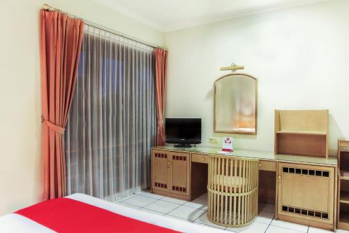Μια τηλεόραση ή/και κέντρο ψυχαγωγίας στο Hotel O Puri Lotus