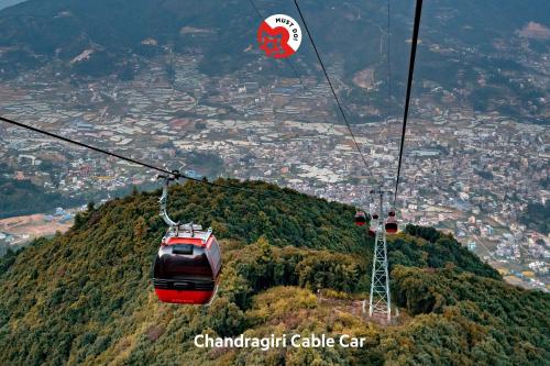 a gondola flying over a mountain at Waling Fulbari Guest House in Bālāju