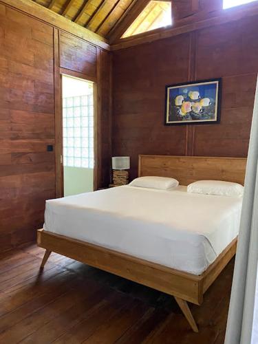 Katil atau katil-katil dalam bilik di Shanti Life Wooden House