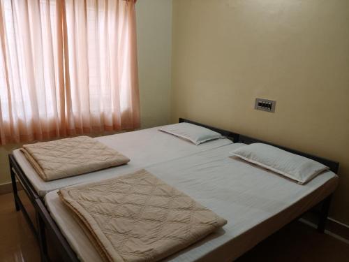Postel nebo postele na pokoji v ubytování Nomad nest