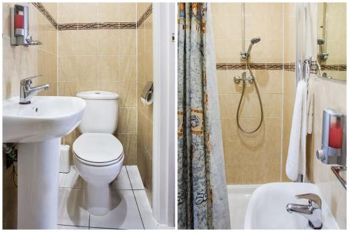 a bathroom with a toilet and a sink and a shower at OYO London Guest House in London