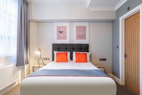 Townhouse Apollo, Hyde Parkにあるベッド