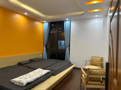 Кровать или кровати в номере Rose house