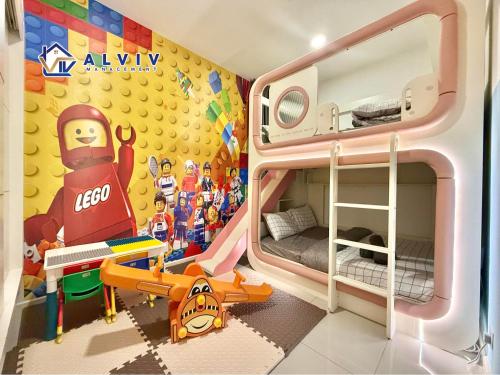 Una cama o camas en una habitación de The Shore Kids Wonderland I Family 6-10pax I Kids Friendly I JonkerSt