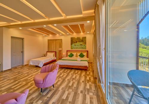 Cama o camas de una habitación en Vihani's Western Clouds Ooty by VOYE HOMES