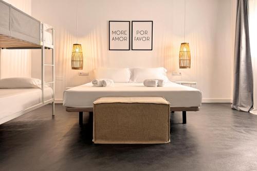 Postel nebo postele na pokoji v ubytování Hostal Boutique Bajío