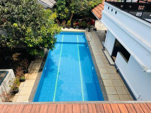 Gambar di galeri bagi 2Empire One Bedroom with Common Pool di Wayanad