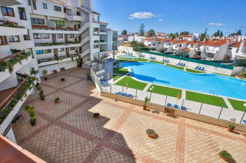Πισίνα στο ή κοντά στο Luxe Condo with Pool, Airco and Seaview Balcony - Go4Portugal - Albufeira