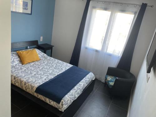 Ένα ή περισσότερα κρεβάτια σε δωμάτιο στο villa méditerranéé