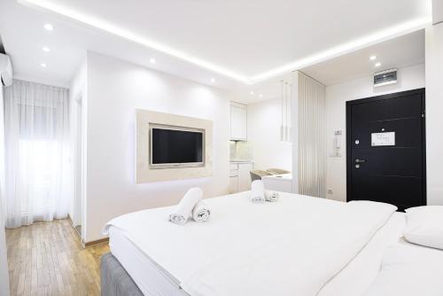 Katil atau katil-katil dalam bilik di White Apartments