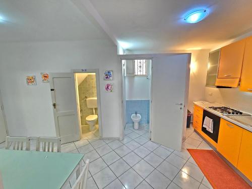 Kuchyň nebo kuchyňský kout v ubytování Cortile Maggiore Home