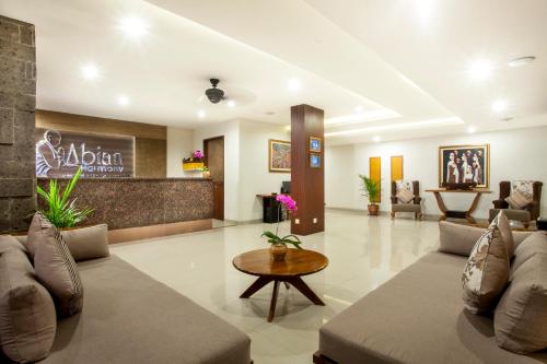 The lobby or reception area at Abian Harmony Hotel