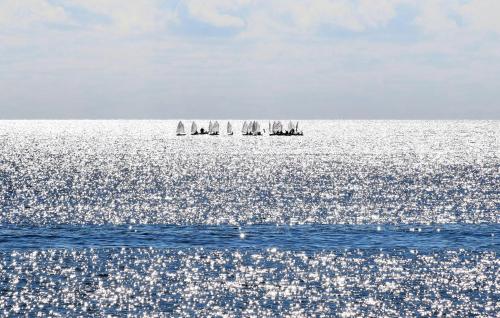 a group of sailboats in the ocean on the water at Awesome Apartment In Reggio Calabria in Reggio Calabria