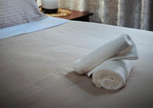 Ένα ή περισσότερα κρεβάτια σε δωμάτιο στο Khami Guesthouse