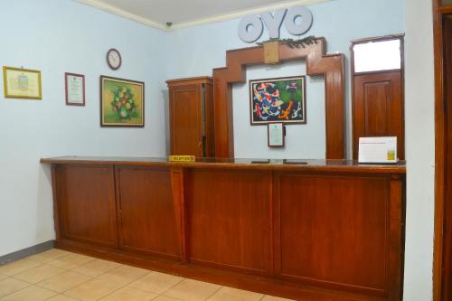 a reception desk in a court room at Hotel O Pantai Jaya in Pangandaran