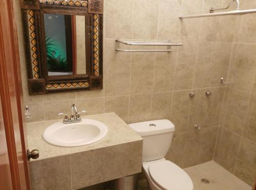 Koupelna v ubytování Hotel Hacienda Margot