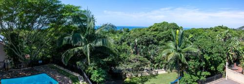 an aerial view of a resort with trees and a swimming pool at Marion Views in Ballito