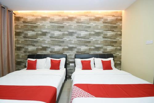 Hotel O Ys Innにあるベッド