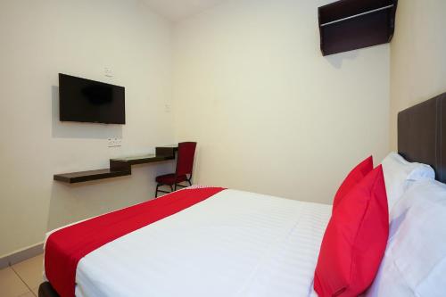 TV a/nebo společenská místnost v ubytování Hotel O Jj Hotel Sitiawan