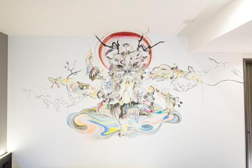 a mural on a wall in a room at Randor Residence Kyoto Nijo Castle in Kyoto
