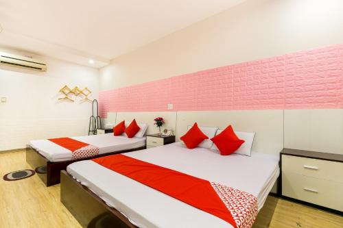 Postel nebo postele na pokoji v ubytování OYO 373 Habana Hotel