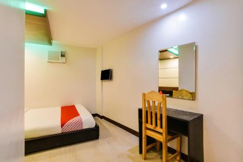 OYO 473 Ranchotel Drive-inにあるベッド