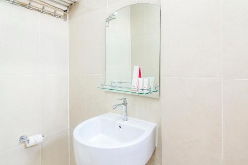 Un baño de Capital O 1867 Kara Guest House