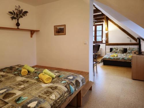 a bedroom with a bed in a room at Ubytování U MAXÍKA in Suchdol nad Lužnicí