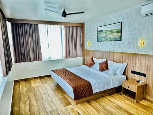 Postel nebo postele na pokoji v ubytování Olga Resorts