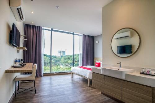 TV a/nebo společenská místnost v ubytování Hotel O Mokka Hotel