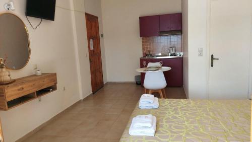 Postel nebo postele na pokoji v ubytování Sea Breeze Apartments