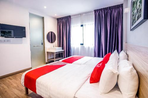 Postel nebo postele na pokoji v ubytování Hotel O Mokka Hotel