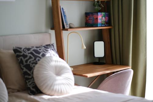 TV a/nebo společenská místnost v ubytování Neringarent STUDIO-APARTAMENTAI