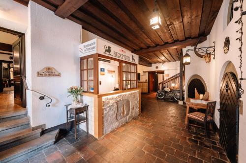 a large room with a counter in a building at Löwen Hotel & Restaurant in Marktbreit