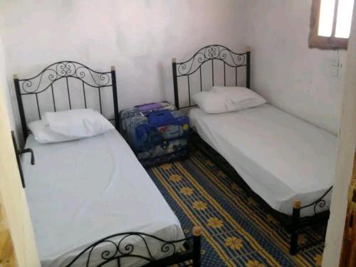 Cama o camas de una habitación en Gîte du lac chez bennouri