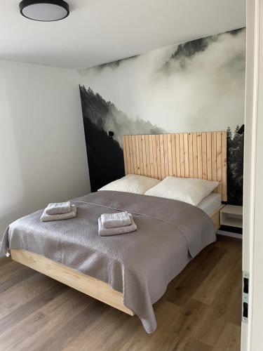 Postel nebo postele na pokoji v ubytování Chalet Aria