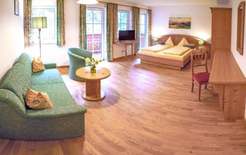 Postel nebo postele na pokoji v ubytování Aparthotel Alpenpark