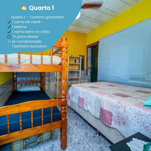 two bunk beds in a room with yellow walls at Sun House WSL in Saquarema