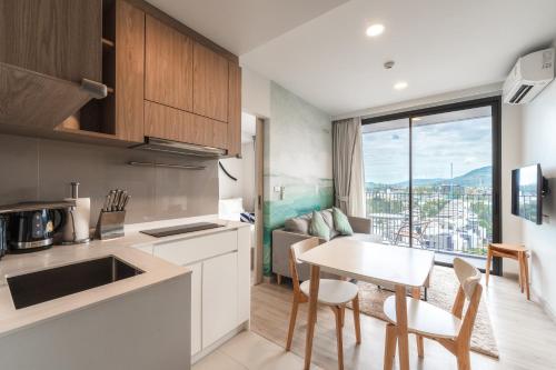 Η κουζίνα ή μικρή κουζίνα στο Laguna Skypark Residences