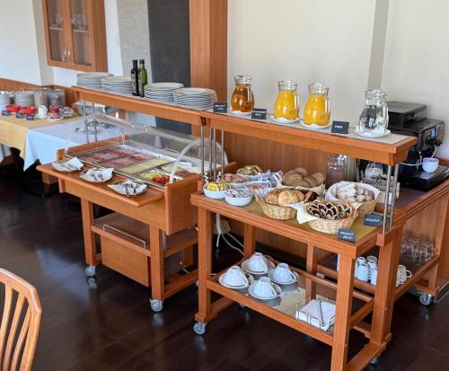 a buffet with a lot of food on display at Penzión Bojnice in Bojnice