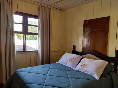 Postel nebo postele na pokoji v ubytování La Colonial I Típica Casa Serrana