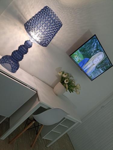 TV a/nebo společenská místnost v ubytování B&B Casa Gabriele