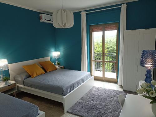 Postel nebo postele na pokoji v ubytování B&B Casa Gabriele