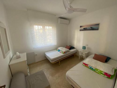 Ένα ή περισσότερα κρεβάτια σε δωμάτιο στο Casa Lovia