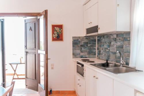 Η κουζίνα ή μικρή κουζίνα στο Infinity I - Stylish Apartment with Views