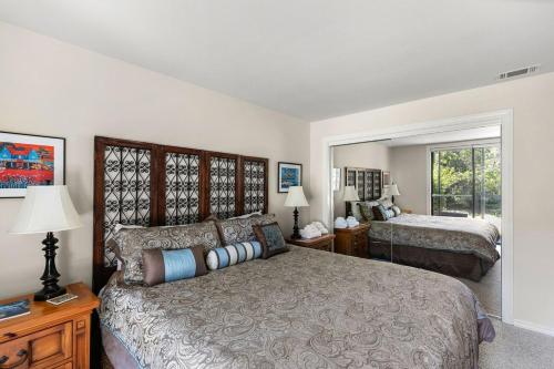 a bedroom with a large bed and two beds at Stunning views near beaches and bluff in Sea Ranch