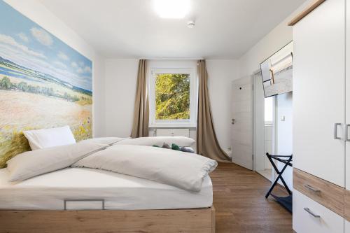 Ένα ή περισσότερα κρεβάτια σε δωμάτιο στο A Nossa Casa Atlantic